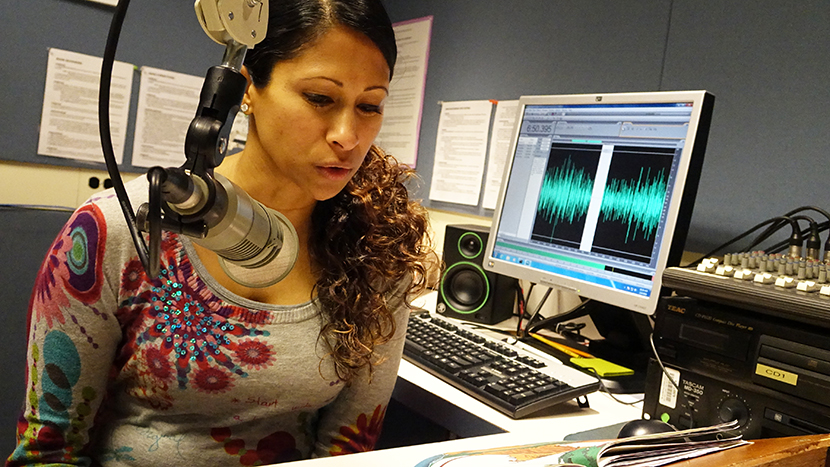A volunteer narrator records a book in the studios at the Washington Talking Book & Braille Library.
