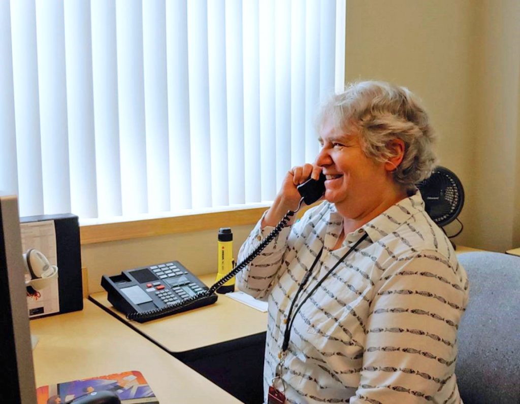 Judy Pitchford, Central Library Operations Coordinator at Washington State Library, helps a customer who called WSL’s Ask a Librarian service.