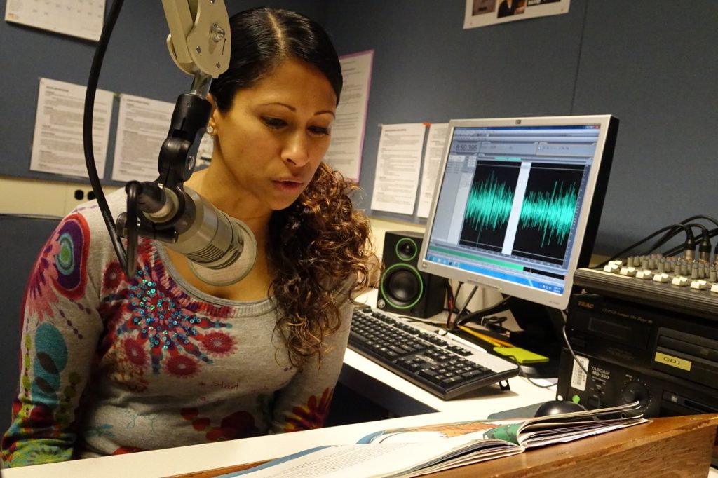 A WTBBL Audio Department volunteer recording an audiobook (Photo: Washington Talking Book & Braille Library)