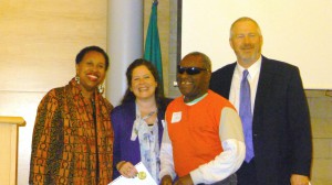 Germaine Covington (Master of Ceremonies), Danielle Miller (WTBBL Program Manager), Quincy (WTBBL Patron) and Mayor Mike McGinn